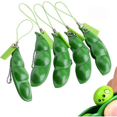 China Hot Cute Soft Material Decompression Soft Silicone Material Pea Pod Factory Selling Silicone Busty Person Squeeze Bean Squeeze Key Chain Direct Pendant for sale