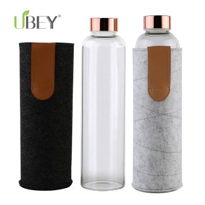 China Sustainable Eco Friendly Borosilicate Brief Rose Gold Stainless Steel Lid Glass Water Bottle For Sports for sale