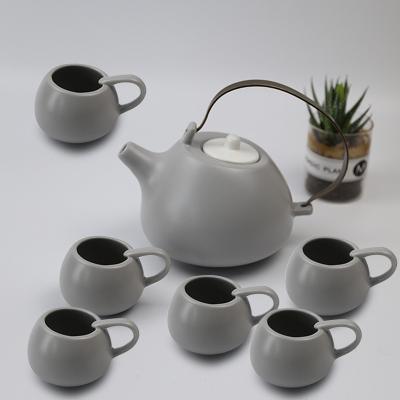 China Creative Luxury Art Colored Ceramic Tea Pot Sets Morden Design Mug and Six Cups Set for sale