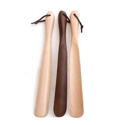 China Custom Made Goods Wooden Long Handle Natural Wooden Shoe Horn for sale