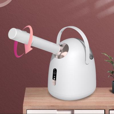 中国 Hot and cold spray ion atomization face steamer with smart display face moisturizing and brightening 販売のため