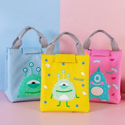 China Waterproof monster printing students kawaii lunch bags packaging for school kids cooler bag waterproof logo insulated packing bag for sale