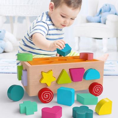 China Children's Toys Kindergarten Educational Wooden Multifunctional Shape Matching Building Block Toy Drag Car Kids Cognitive Toys for sale