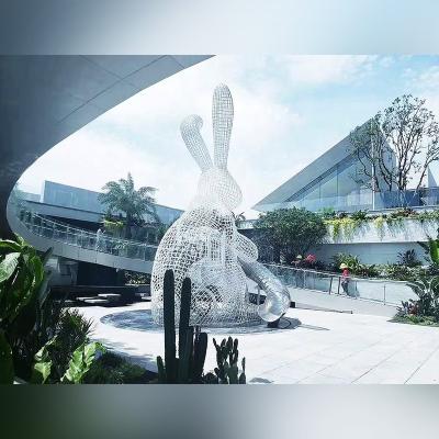 China China Rabbit Huge Hollow Stainless Steel Tube Outdoor Slide Sculpture for sale