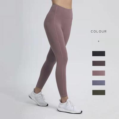 China Pants new autumn and winter women's fitness pants wholesale tight sports lulu waist yoga casual hip-lifting naked pants for sale