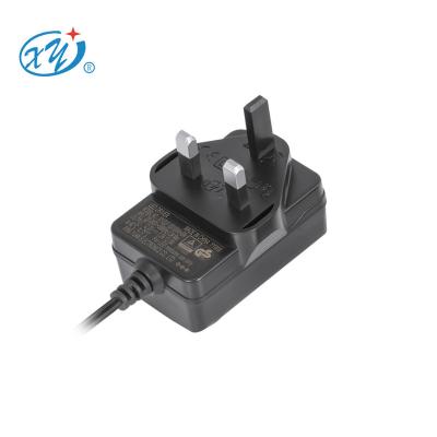 China High Quality Lightweight EU Plug Adapter 6V 9V 12V 24V 30V 36V 0.5A 1A 2A DC to AC Power Supply UK Adapter for sale