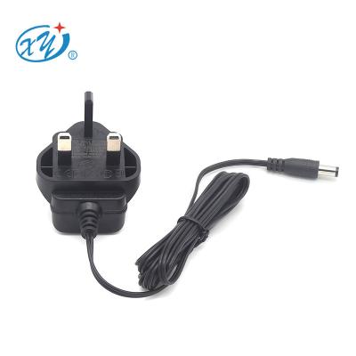 China Guangdong factory price CE GS UKCA 12V 500mA AC/DC power adapters for led strip light XY06JC-1200500H-BW for sale