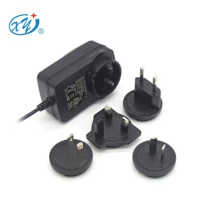 China high quality EU US UK AU plug interchangable AC adapter 12V 24V 30V 32V 36V 1A 2A 3A DC to AC power adapter XY36SC-120300VQ-ZW for sale