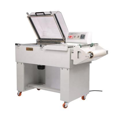 China FM-5540 2 New 2021 New 2021 Fashionable FM-5540 2-in-1 Food Shrink Packing Machine China Cheap Sealing Packaging Machine for sale