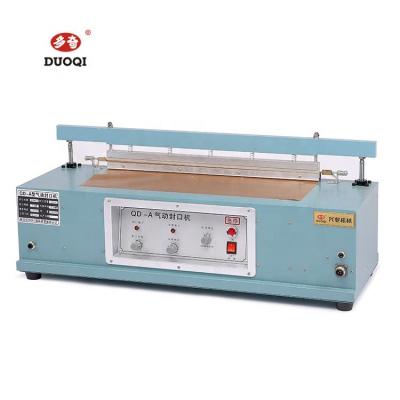 China DUOQI QD-A600 food aluminum body pneumatic tabletop sealing machine for commodity industry for sale