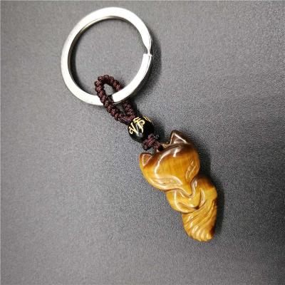 China Energy Healing Wholesale Yellow Tiger Eye Natural Stone Key Chain Caved Fox Energy Stone Key Chain Fashion Key Chain Jewelry for sale