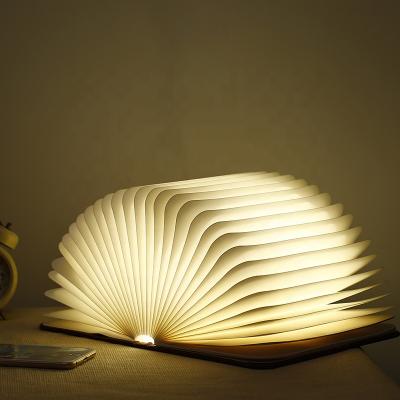 China Foldable Flip Folding Book Light Colorful USB Rechargeable Book Lamp Bedroom Night Light Home Origami Top LED Shaped Light for sale