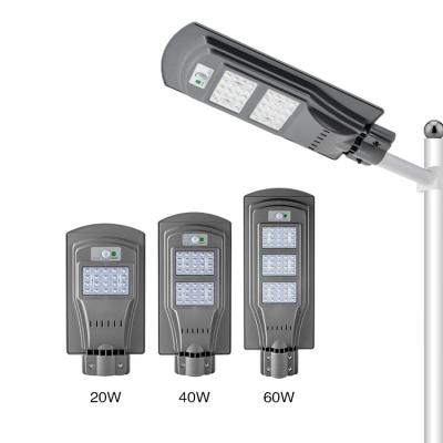 China Outdoor All In One Solar Panel IP65 30W 60W 90W 120W ABS Material Solar Led Street Light for sale