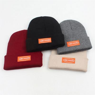 China JOINT Classic Fine Weave Acrylic Custom Embroidered Felt Patch Knitted Skullcap for sale