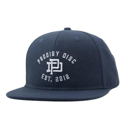 China COMMON 100% Acrylic Embroidery Navy Blue Snapback Flat Cap With Custom Label Back Cap for sale