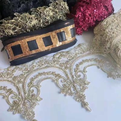 China Water soluble champagne gold lace fabric embroidery flower rope border lace women dressy dresses lace fabric for sale