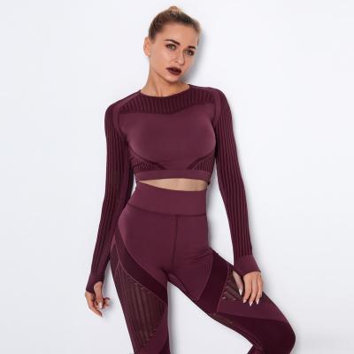 China 2021 New Europe/USA Back Breathable Bow Jacquard Hollowed-out Fitness Women Yoga Seamless Long Sleeve Tops for sale