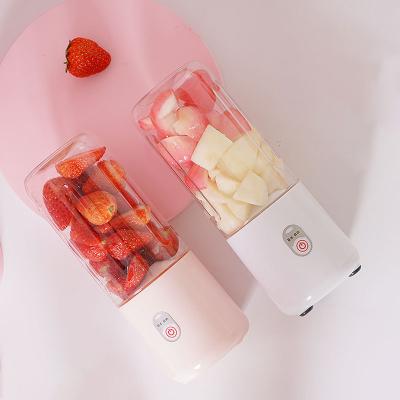 China Outdoor Portable Pink Fruit 4 Blades Blender Mini Orange Juicer Extractor Stainless Steel for sale