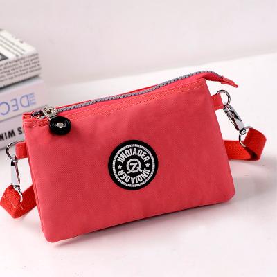 China 2021 New Arrivals Custom Designer Fashion Soft Material Ladies Cross - Body Handbag Purse Mini Female Girl Women Cell Phone Bag for sale