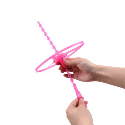 China Hot Outdoor Creative Hand Propelled Flying Saucer Glowing Outdoor Toys On Sale Toys With LED Light For Kids Toys for sale