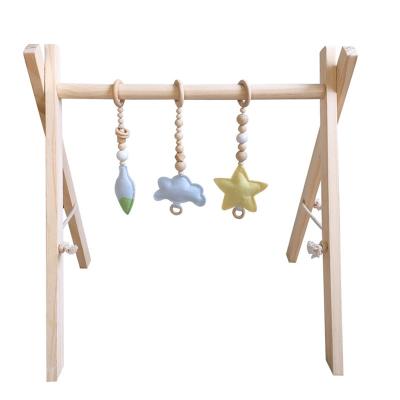 China Fitness wooden wooden frame hanging toys for baby to play gym. for sale