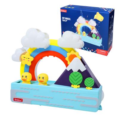 China Custom Environmental Protection Material Water Toys Rainbow Duck Ride Music Light Baby Bath Toys Spray for sale