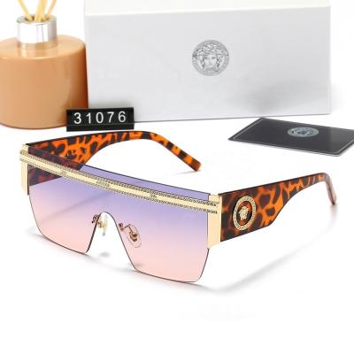 China Fashion Sunglasses 31076 2022 Luxury Trendy Oversized Sunglasses Shape Men Women Shading Color Rimless Sunglasses for sale