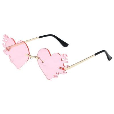 China New Arrival Fashion Sunglasses Ladies Fire Shape Rimless Heart Shaped Sunglasses Special Design Frameless Sunglasses Women for sale