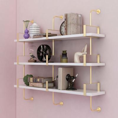 China Wholesale Light Luxury Wall Mounted Shelf Corrosion Protection Gold Beauty Salon Furniture Storage Decorative Wall Rack for sale