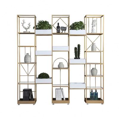 China (Other) Nordic Wholesale Adjustable Art Shelf Furniture Floor Creative Living Room Bookcase Display Rack Metal Shelf Storage Rack for sale