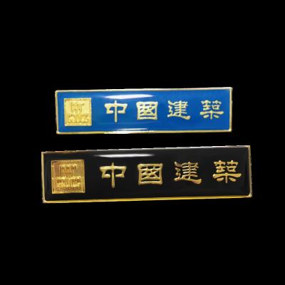 China China custom cheap metal soft enamel partner name magnet badge with safety pin for sale