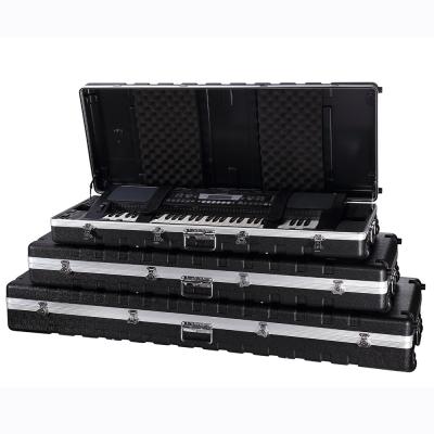 China ABS 61 Key Piano Keyboard Case With Wheels Waterproof Hard Shell for sale