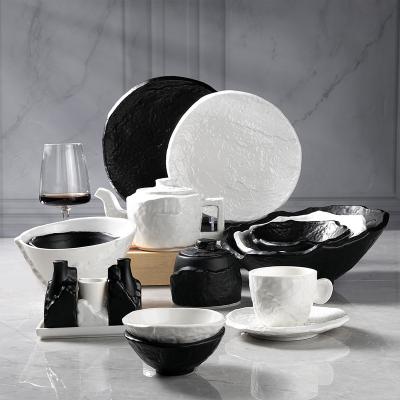 China Amazon Viable Hot Selling Embossed Black Stone Reactive Matte Printing Dish Reactive Matte Porcelain Dinner Plate Hotel Dinnerware Rustic Dinnerware for sale