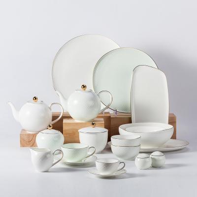 China YAYU Style Gold Sustainable High End French Rim Embossed Porcelain Homeware Set Ceramic Dishes Bowls Tea Cups Set Fine Bone China Dinnerware for sale