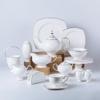 China YAYU Bone China Sustainable Design Luxury Dinnerware Set With Gold Rim White Color Ceramic Dish Set Western Style Porcelain Dinnerware Set for sale