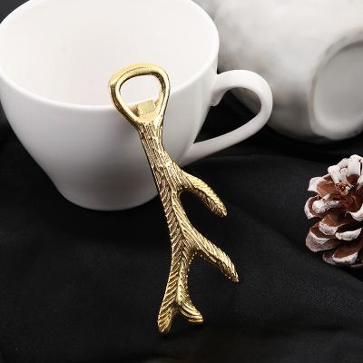 China Viable Personalized Zinc Alloy Antler Shaped Design Bottle Opener Beer Bottle Opener Craft Gift Kitchen Tool for sale