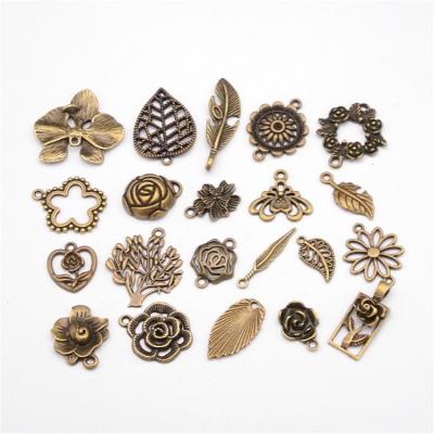 China Hot Sales Vintage Custom Mix Vintage Flowers Antique Bronze Zinc Alloy Pendants Charms for sale