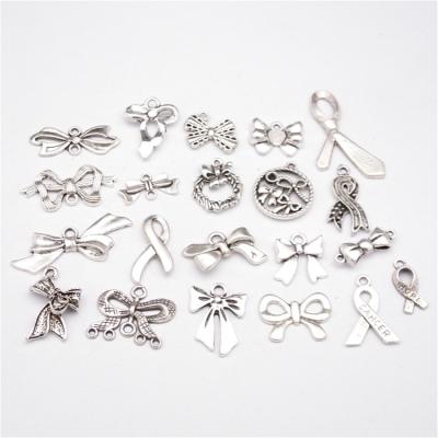 China Fashion Accessories Cute Zinc Alloy Mini Cute Bow Pendant Charm For DIY Jewelry Making for sale