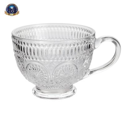 China Large Capacity Sustainable Breakfast Milk Cup Embossed Sunflower Pattern Glass Water Cup for sale