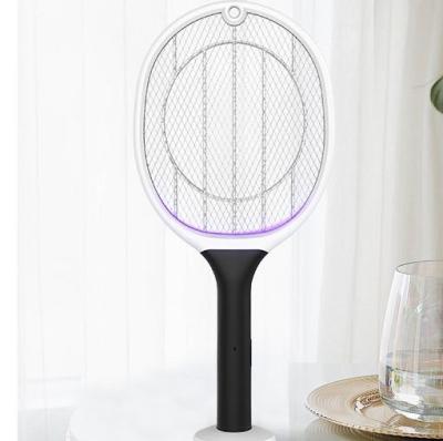 China Stocked Handheld Electric Insect Fly Racket Killer Protect Giant Human Hand Shaped Fly Swatter Fly Killer Mosquito Swatter With Lamp for sale