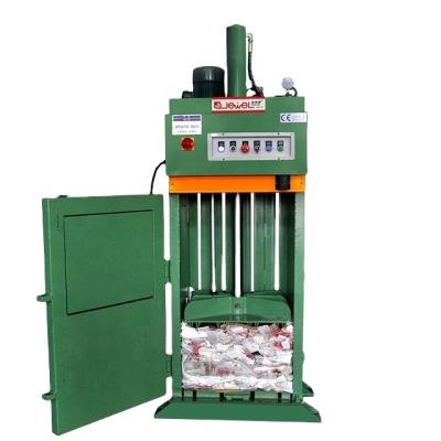 China Waste Paper Vertical Baler Plastic Bale Machine en venta