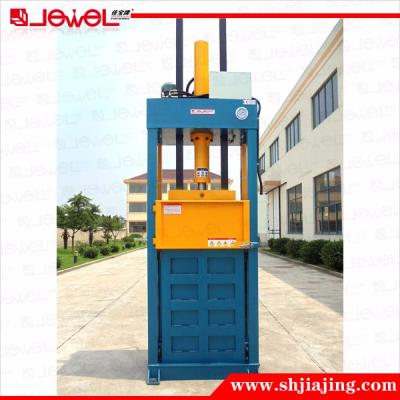 China Vertical 45kg CLOTHING Hydraulic Clothing Wrapping Machine for sale