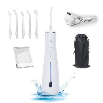 China New Arrival IPX7 Water Floss 300ml Waterproof Dental Flosser Irrigator Electric Flosser With 2500mAh Battery for sale