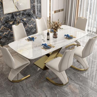 China New Furniture New Designs Material Modern Luxurious Materials Italian Rock Dining Table With Chair Can Customized To Imitate Marble Table for sale