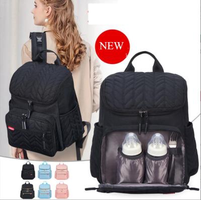 China Creative Embroidered Anti-theft Large Capacity Dry Wet Backpack Baby Diaper Separation Wholesale Luxury Yarn Diaper Bags For Mom for sale