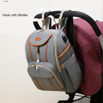 China 2022 Design 2022 Special PORTABLE MOM Small Multifunctional Bag Nylon Diaper Backpack With USB Charger Port for sale