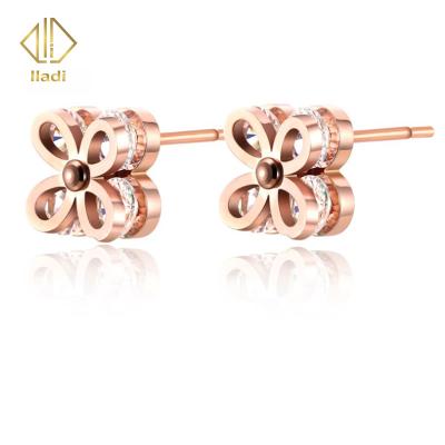 China Stainless Steel Ladies Earrings Designs Women Ethnic Wholesale Fancy Zircon Flower Stud Earrings for sale