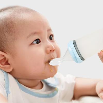 China Hot Selling BPA Free Eco-Friendly Food Grade Non-Toxic Silicone Wide Soft Squeezable Newborn Baby Mouth Feeding Bottle With Spoon for sale