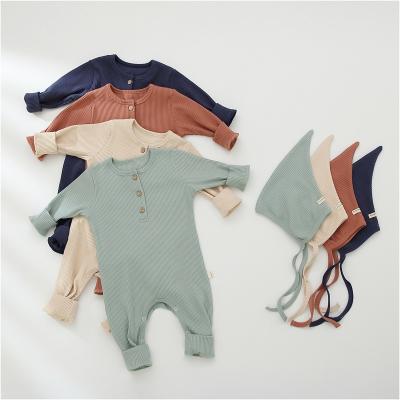 China Comfotable Solid Color Boy Romper Cotton Newborn Pajamas Hide Kids Rompers Overalls for sale