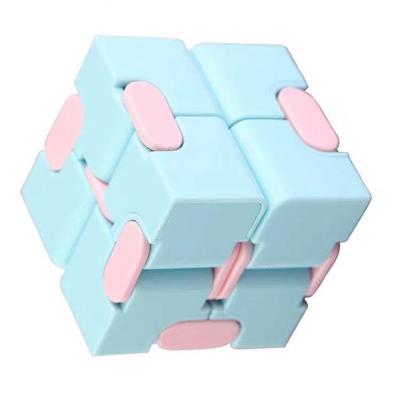 China Children Eductional Toy High Quality Kids Portable Relaxing Macaron Color Fingertip Plastic Infinity Cube Magic Toy for sale